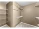 View of the walk-in closet that offers plenty of shelving at 3595 Ansley Park Dr, Suwanee, GA 30024