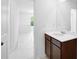 Bathroom featuring a vanity with sink and tiled floor at 4201 Brindle Pl, Loganville, GA 30052