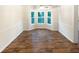 Dining room featuring a ceiling fan, wainscoting and a bay window at 4396 Shelley Nw Ln, Lilburn, GA 30047