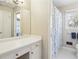 Bathroom with vanity area, storage, and a shower/tub combo at 663 Foxcroft Circle Se, Marietta, GA 30067