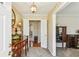 Elegant foyer with hardwood floors, decorative wallpaper, and classic furnishings creating a welcoming entrance at 663 Foxcroft Circle Se, Marietta, GA 30067