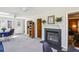 Open living room with a fireplace and plenty of natural light at 663 Foxcroft Circle Se, Marietta, GA 30067