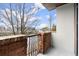 View of the surrounding buildings and sky from the balcony with red brick and black iron railing at 901 Abernathy Ne Rd # 3220, Sandy Springs, GA 30328