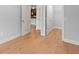 Spacious bedroom with hardwood floors offers views to the kitchen and closet at 901 Abernathy Ne Rd # 3220, Sandy Springs, GA 30328