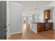 Inviting kitchen with wood cabinets, granite countertops, and stainless steel appliances open to a bright living area at 901 Abernathy Ne Rd # 3220, Sandy Springs, GA 30328