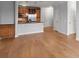 A partial view of a kitchen with stainless steel appliances, a granite countertop and custom cabinets at 901 Abernathy Ne Rd # 3220, Sandy Springs, GA 30328