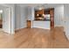 A partial view of a kitchen with stainless steel appliances, a granite countertop and custom cabinets at 901 Abernathy Ne Rd # 3220, Sandy Springs, GA 30328