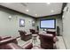 Home theater setup with comfortable seating and a large screen for immersive entertainment experiences at 901 Abernathy Ne Rd # 3220, Sandy Springs, GA 30328