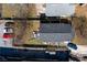 A top-down aerial view reveals the home's roof, backyard, and adjacent parking area at 999 Washington Sw St, Atlanta, GA 30315