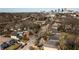 Aerial view shows this property in a neighborhood setting with the city skyline in the distance at 999 Washington Sw St, Atlanta, GA 30315