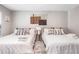 Inviting bedroom featuring two beds, soft lighting, and tasteful decorations at 999 Washington Sw St, Atlanta, GA 30315