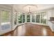 Bright breakfast nook with hardwood floors and an abundance of windows at 2480 Flint Creek Dr, Cumming, GA 30041