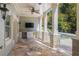 Covered patio with ceiling fan, outdoor kitchen, and columns offering shade and privacy at 2480 Flint Creek Dr, Cumming, GA 30041