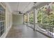 Covered patio with ceiling fan overlooking a private backyard at 2480 Flint Creek Dr, Cumming, GA 30041