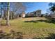 A large backyard and deck create a relaxing outdoor space at 2607 Westchester Se Pkwy, Conyers, GA 30013