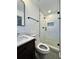 Beautiful bathroom featuring a glass shower, subway tiles, and sleek black hardware at 3147 Bellgreen Way, Decatur, GA 30032