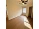 Bright bedroom with wood floors, ceiling fan and a closet at 3147 Bellgreen Way, Decatur, GA 30032