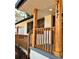 Close-up of the renovated front porch, featuring new railings and a freshly painted address at 3147 Bellgreen Way, Decatur, GA 30032