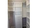 Walk-in closet provides shelving with drawers and hanging storage at 346 Carpenter Drive Ne Dr # 32, Sandy Springs, GA 30328