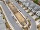 Aerial view of the neighborhood with townhomes and green spaces at 347 Bailey Walk, Alpharetta, GA 30009