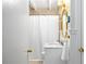 Charming bathroom features a shower with curtain, vanity sink, and elegant fixtures at 436 Carolwood Ln, Atlanta, GA 30342