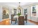 Cozy dining room with natural light and a view to the back deck and back yard at 436 Carolwood Ln, Atlanta, GA 30342