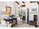 Living room area showcases natural light, exposed beams, fireplace, and hardwood floors at 436 Carolwood Ln, Atlanta, GA 30342