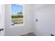 Bright laundry room with a window and hookups for washer and dryer at 1744 Fawlocke Run, Loganville, GA 30052