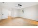 Bright bedroom featuring a ceiling fan and access to an ensuite bathroom at 3113 Bellgreen Way, Decatur, GA 30032