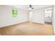 Spacious bedroom featuring a ceiling fan and access to an ensuite bathroom at 3113 Bellgreen Way, Decatur, GA 30032