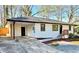 Beautifully renovated home featuring a freshly painted exterior and new landscaping at 3113 Bellgreen Way, Decatur, GA 30032