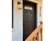Close-up of a stylish front door with a modern light fixture at 3113 Bellgreen Way, Decatur, GA 30032