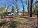 Charming single-story house with a well-maintained lawn, mature trees, and inviting curb appeal at 3113 Bellgreen Way, Decatur, GA 30032