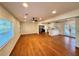 Bright and airy living room featuring hardwood floors and a ceiling fan at 3113 Bellgreen Way, Decatur, GA 30032