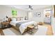 Cozy main bedroom featuring natural light, stylish furnishings, and an ensuite bathroom at 3113 Bellgreen Way, Decatur, GA 30032