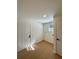 Bright room featuring modern vinyl floors, ample lighting and access to laundry connections at 3113 Bellgreen Way, Decatur, GA 30032