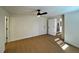 Bright room featuring modern vinyl floors, ample lighting and access to additional rooms at 3113 Bellgreen Way, Decatur, GA 30032
