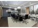 Spacious conference room with large table, chairs, and natural light at 3481 Lakeside Ne Dr # 1705, Atlanta, GA 30326