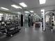 Spacious gym area with weights, machines, and mirrored walls at 3481 Lakeside Ne Dr # 1705, Atlanta, GA 30326