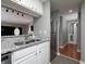 Modern kitchen featuring stainless steel appliances, granite countertops, and white cabinets for a clean and updated look at 3481 Lakeside Ne Dr # 1705, Atlanta, GA 30326