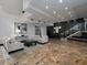 Stunning lobby with marble floors, modern decor, and elegant seating at 3481 Lakeside Ne Dr # 1705, Atlanta, GA 30326