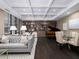 Elegant lounge area with piano, comfortable seating, and stylish decor at 3481 Lakeside Ne Dr # 1705, Atlanta, GA 30326