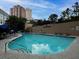 Community pool and lounge area for Grandview residents to enjoy the sun with patio furniture and a resort style pool at 3481 Lakeside Ne Dr # 1705, Atlanta, GA 30326