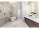 Spa-like bathroom with a freestanding tub, sleek fixtures, and a modern vanity with double sinks at 904 Kings Ne Ct, Atlanta, GA 30306