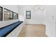 Bedroom featuring hardwood floors and expansive windows with neighborhood views at 904 Kings Ne Ct, Atlanta, GA 30306