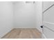 Walk-in closet with hardwood floors and modern design at 904 Kings Ne Ct, Atlanta, GA 30306