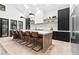 Gourmet kitchen features a large island with bar seating and custom cabinetry at 904 Kings Ne Ct, Atlanta, GA 30306