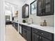 Modern kitchen with sleek cabinetry, stone backsplash, and stainless steel appliances at 904 Kings Ne Ct, Atlanta, GA 30306