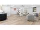 Bright living room featuring modern furniture, light hardwood floors, and neutral decor at 904 Kings Ne Ct, Atlanta, GA 30306