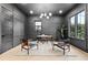 Sophisticated office with dark walls, modern lighting, and hardwood floors offers a stylish workspace at 904 Kings Ne Ct, Atlanta, GA 30306